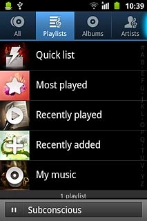 Press Playlists at the top of the display.