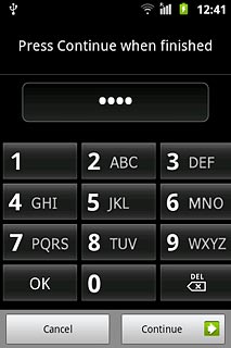Key in the required phone lock code and press Continue.