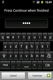 Key in the required phone lock code and press Continue.