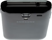 Turn the back of your phone towards you.Take hold of the top of the back cover and remove it.