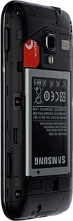 Turn the memory card as illustrated in the memory card holder.