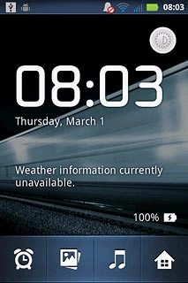 Press the alarm icon.