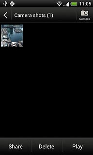 Go to the required folder.Press and hold the required picture or the required video clip until a pop-up menu is displayed.