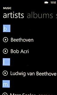 Slide your finger left to select the required category.Go to the required audio file or playlist.