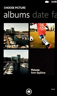 To take a new picture:Press the camera icon.
