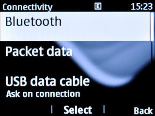 Scroll to Bluetooth and press the Navigation key.
