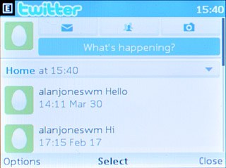 Scroll to What's happening? and press the Navigation key.