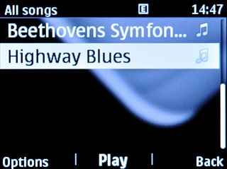 Go to the required category.Highlight the required audio file and press Options.