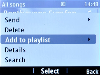 Scroll to Add to playlist and press the Navigation key.