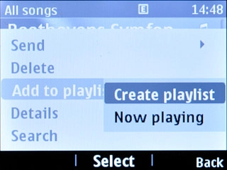 Scroll to Create playlist and press the Navigation key.