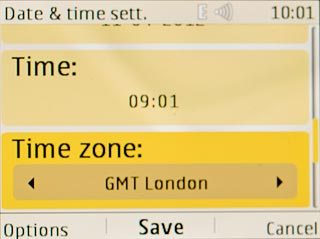 Scroll to Time zone and press Navigation key right to select the required time zone.