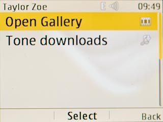 Scroll to Open Gallery and press the Navigation key.Go to the required folder.