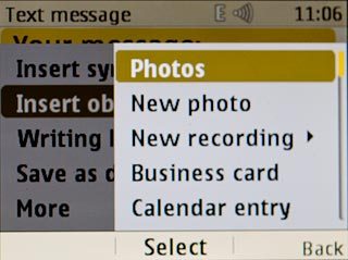 Scroll to Photos and press the Navigation key.