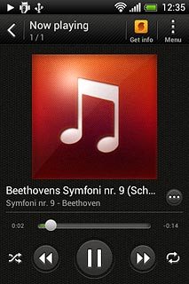 To fast forward or rewind the current audio file:Press and drag the indicator right or left.