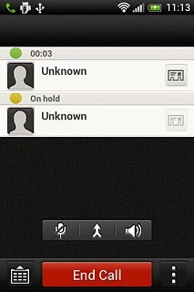 Your calls are displayed on a list and the call on hold is indicated by On hold.