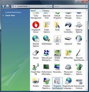 Double-click Programs and Features.