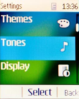 Scroll to Tones and press the Navigation key.