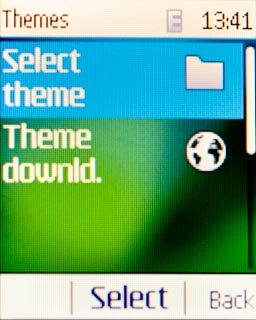 Scroll to Select theme and press the Navigation key.Go to the required folder.