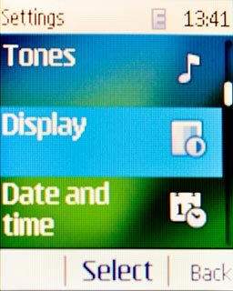 Scroll to Display and press the Navigation key.