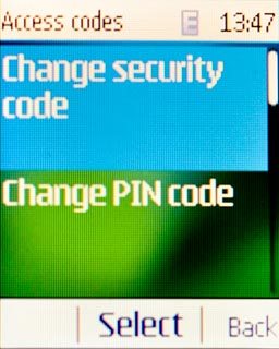 Scroll to Change security code and press the Navigation key.