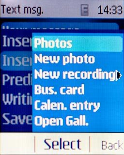 Scroll to Photos and press the Navigation key.
