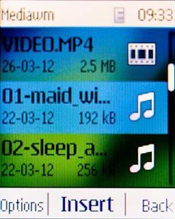 Highlight the required audio file and press the Navigation key.
