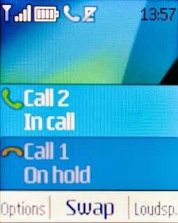 In call is displayed below the active call.