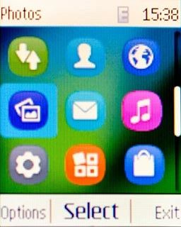 Scroll to Photos and press the Navigation key.