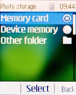Highlight Memory card or Device memory and press the Navigation key.