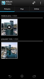 Press and hold the required picture or the required video clip to select it.