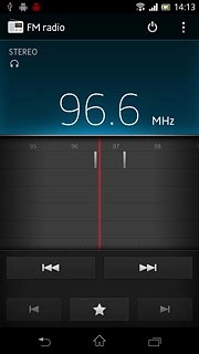 The radio searches for channels and the channels found are displayed on the dial.