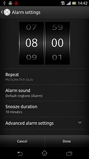 Slide hours and minutes up or down to set the time.