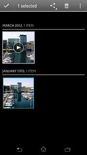 When a picture or video clip is displayed in a blue frame, it's selected.
