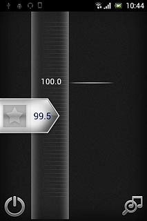 The radio searches for channels and the channels found are displayed on the dial.