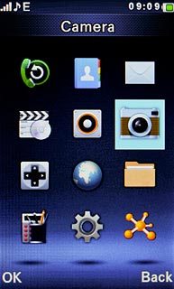 Scroll to Camera and press the Navigation key.