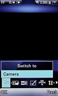 Scroll to Camera and press the Navigation key.