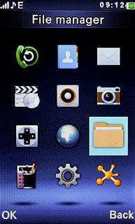 Scroll to File manager and press the Navigation key.