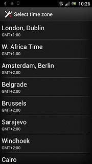 Press the required time zone.