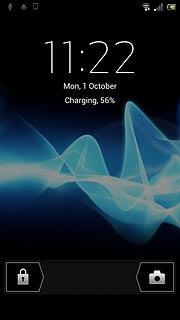 Press and drag the unlock icon right.
