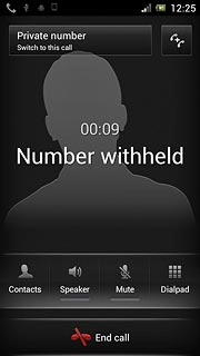 The active call is displayed at the centre of the display.Press Switch to this call to turn on the call on hold.
