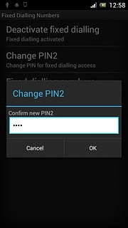 Key in the new PIN2 again and press OK.