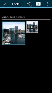 When a picture or video clip is displayed in a blue frame, it's selected.