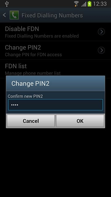 Key in the new PIN2 again and press OK.