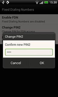 Key in the new PIN2 again and press OK.