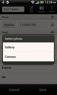 To take a new picture:Press Camera.
