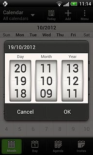 Press and drag day, month and year up or down to select the required date.