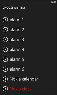 Press the playback icon next to the different alarm tones to hear them.