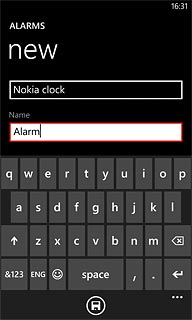 Press the field below Name and key in the required name.