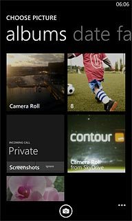 To take a new picture:Press the camera icon.