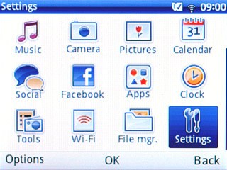 Scroll to Settings and press the Navigation key.